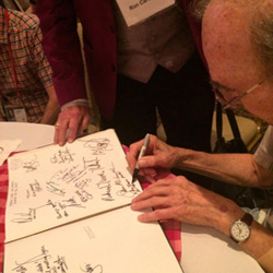 Walter Blaney signing an autograph